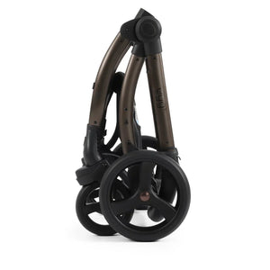 A sleek foldable stroller with a matte bronze frame and black wheels from the egg3 chocolate velvet all stages 360 bundle