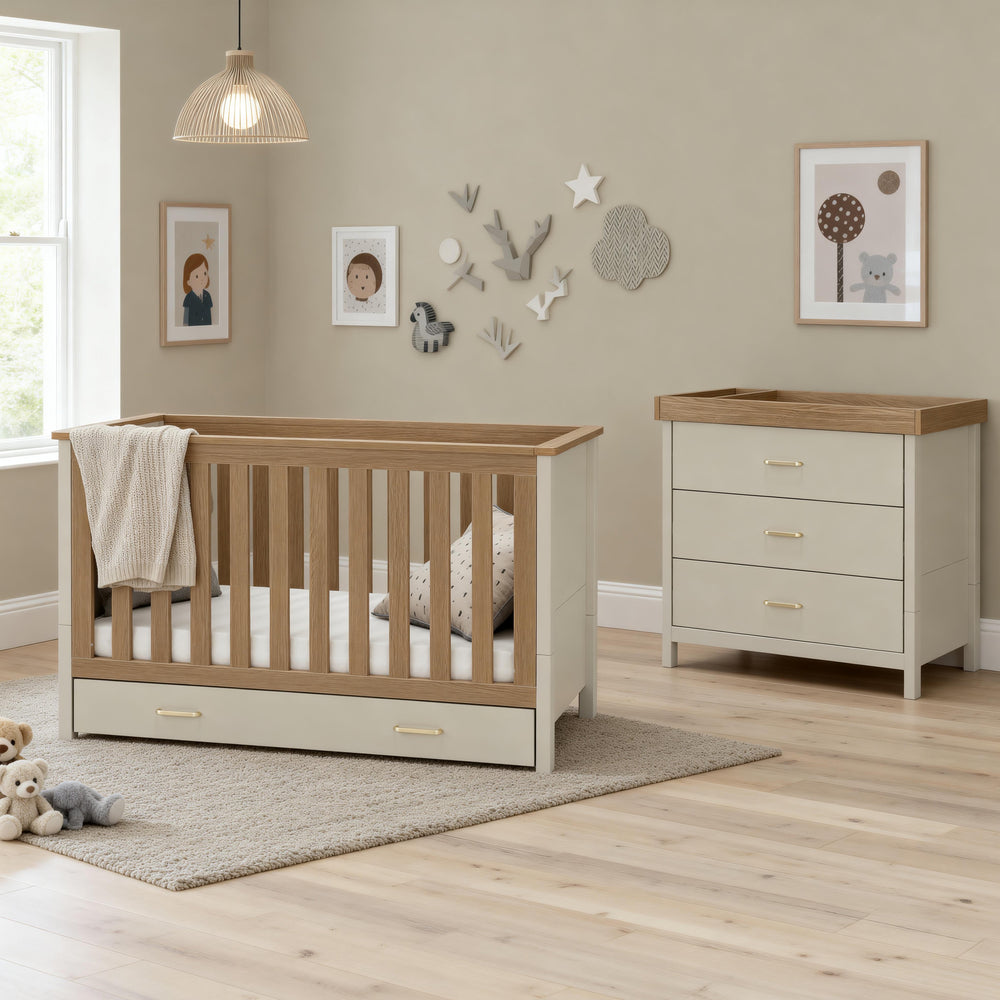Babymore Mira 2 piece nursery furniture set cashmere warm oak beige and light wood baby crib with slatted sides and drawer