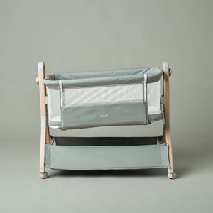 OBaby Cloud Bedside Crib Bundle Including Fitted Sheets – Sage displayed with fitted sheets.