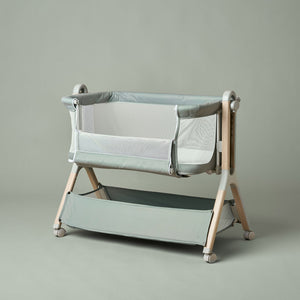 OBaby Cloud Bedside Crib Bundle Including Fitted Sheets – Sage displayed with fitted sheets.