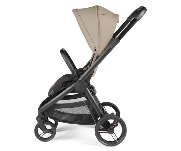 Black peg perego city loop pro stroller with beige canopy and mesh storage basket shown from the back side