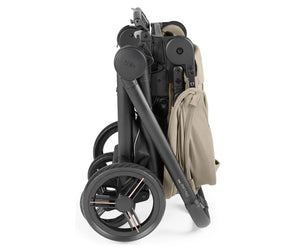 Peg perego city loop pro stroller bassinet bundle in vanilla blend with black and beige foldable design and sturdy wheels