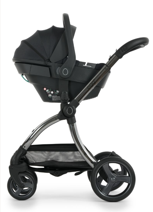 Black infant car seat with a sleek modern design and metallic silver frame from egg3 carbonite luxury bundle