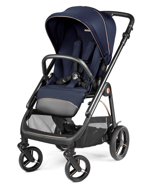Navy blue and black peg perego veloce deluxe travel system stroller with sleek metallic accents and 360 spin bundle