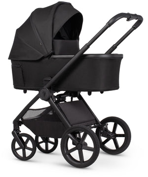 Venicci upline 3 travel system black baby stroller with sleek modern design and matte finish shown from the back side