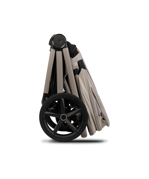 Venicci Upline 3 travel system in pebble beige and black foldable stroller with sleek design and large front wheel