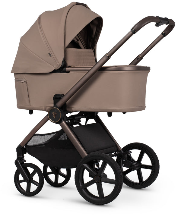 Venicci Upline 3 travel system stroller in sand with beige and black colors, sleek curved canopy, and metal frame