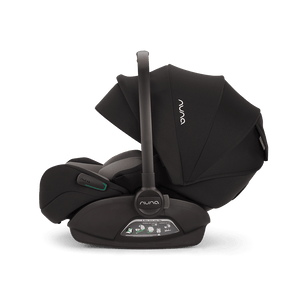 Black nuna arra flex car seat with sleek modern design and subtle teal accent lighting for infants up to 13kg