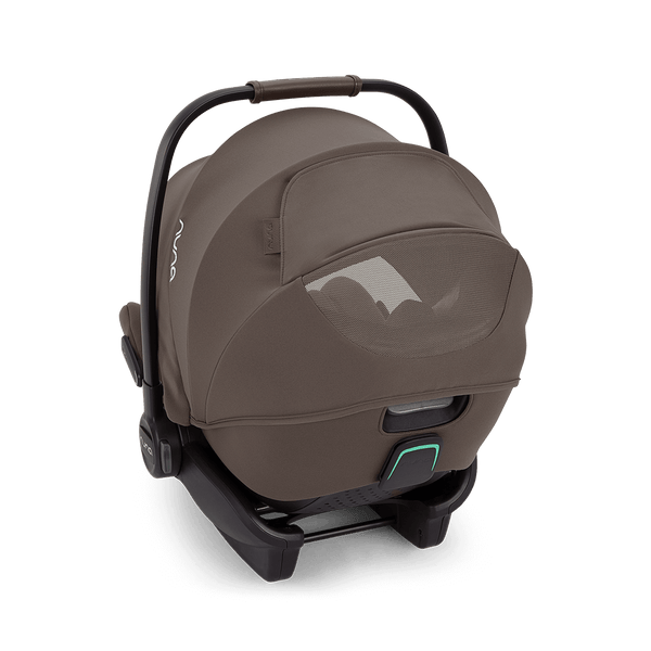 Brown Nuna ARRA Flex car seat with mesh window and black base designed for flat recline and i-Size safety 0–13kg