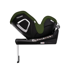 Epic Green TORON 1 KID, reclined rear-facing side view showing silver-trimmed shell and extended support leg.