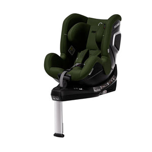 Epic Green TORON 1 KID, angled front view showing padded harness, silver-trimmed shell and extended support leg.