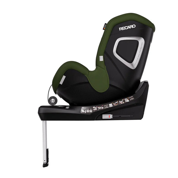 Epic Green TORON 1 KID, forward-facing side view showing silver-trimmed shell, black base and extended support leg.