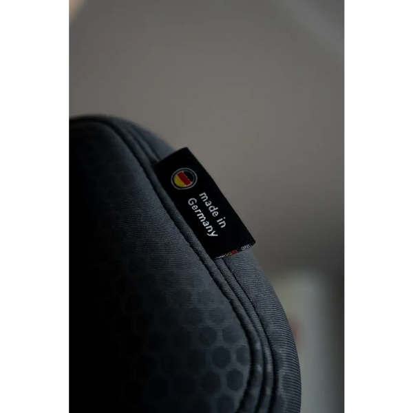 Close-up of Gallant Grey upholstery with double stitching and a Made in Germany fabric label.