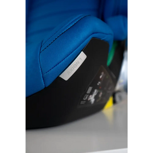 Close-up of Calm Blue seat stitching, the AXION 1 label and black base.