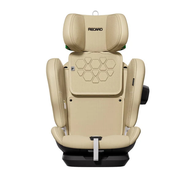 Elegant Beige VELIX 1, front view with raised headrest, no shoulder harness visible and a black side attachment.