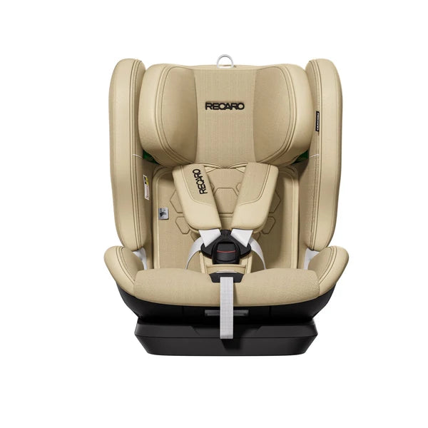 Recaro VELIX 1 in Elegant Beige, front view showing padded shoulder straps, central buckle and adjustment strap.