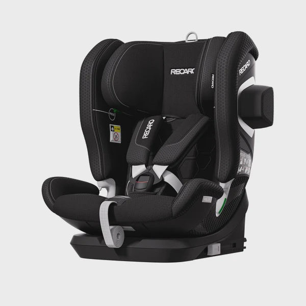 Recaro VELIX 1 in Fresh Black, angled front view with padded harness, black base and outer side attachment.