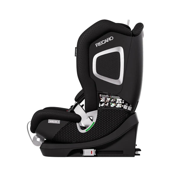 Recaro VELIX 1 in Fresh Black, side view showing silver-trimmed shell, black base and coiled adjustment strap.