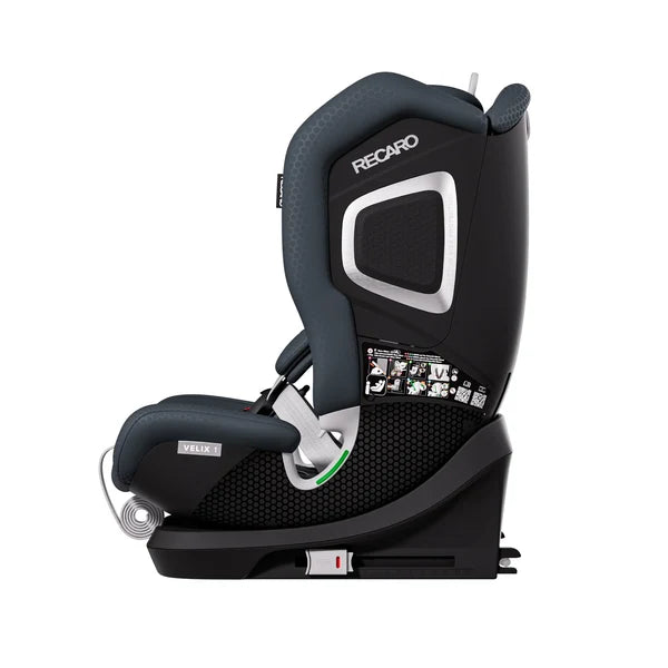 Recaro VELIX 1 in Gallant Grey, side view showing silver-trimmed shell, black base and coiled adjustment strap.