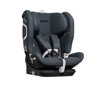 Recaro VELIX 1 in Gallant Grey, angled front view showing padded harness, central buckle and adjustment strap.