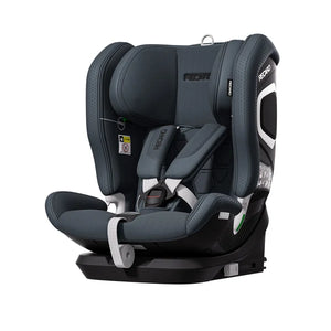 Recaro VELIX 1 in Gallant Grey, angled front view showing padded harness and silver-trimmed side shell.