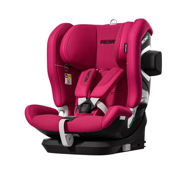 Recaro VELIX 1 in Wow Pink, angled front view with padded harness and a black attachment on the outer side wing.