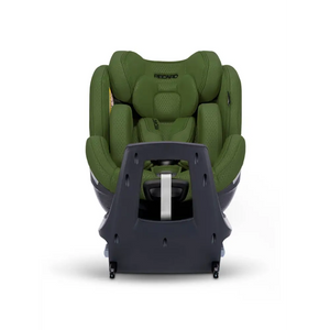 Epic Green XENON 1 with padded insert and harness, viewed across the tall black panel at the end of its base.