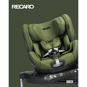 Recaro Epic Green XENON 1 KID, rotated on its base with padded harness beneath a white Recaro logo.