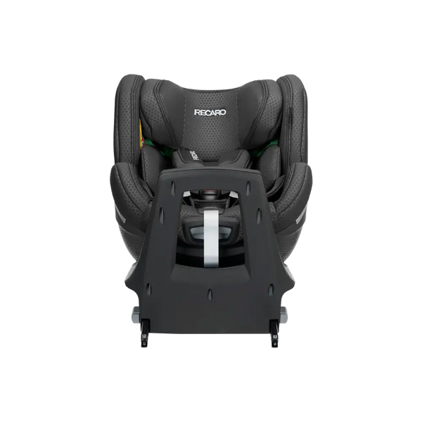 Fresh Black XENON 1 KID with padded harness, viewed across the tall black panel at the end of its base.