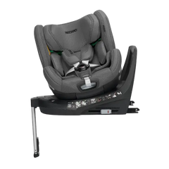 Recaro Gallant Grey XENON 1 KID, rotated on its black base with padded harness and extended silver support leg.
